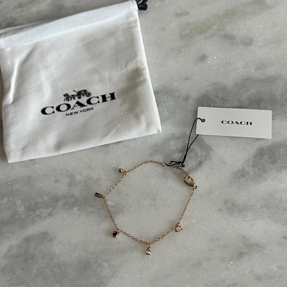 Coach Jewelry - Coach Gold Charm Bracelet